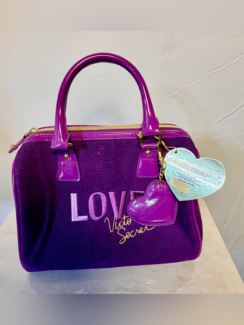 Brand new with tags Victoria's Secret Purple Gloss Satchel with Heart Charm Y2K